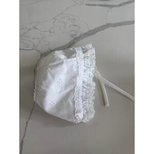 White baby girl lace eyelet bonnet 0–3 M